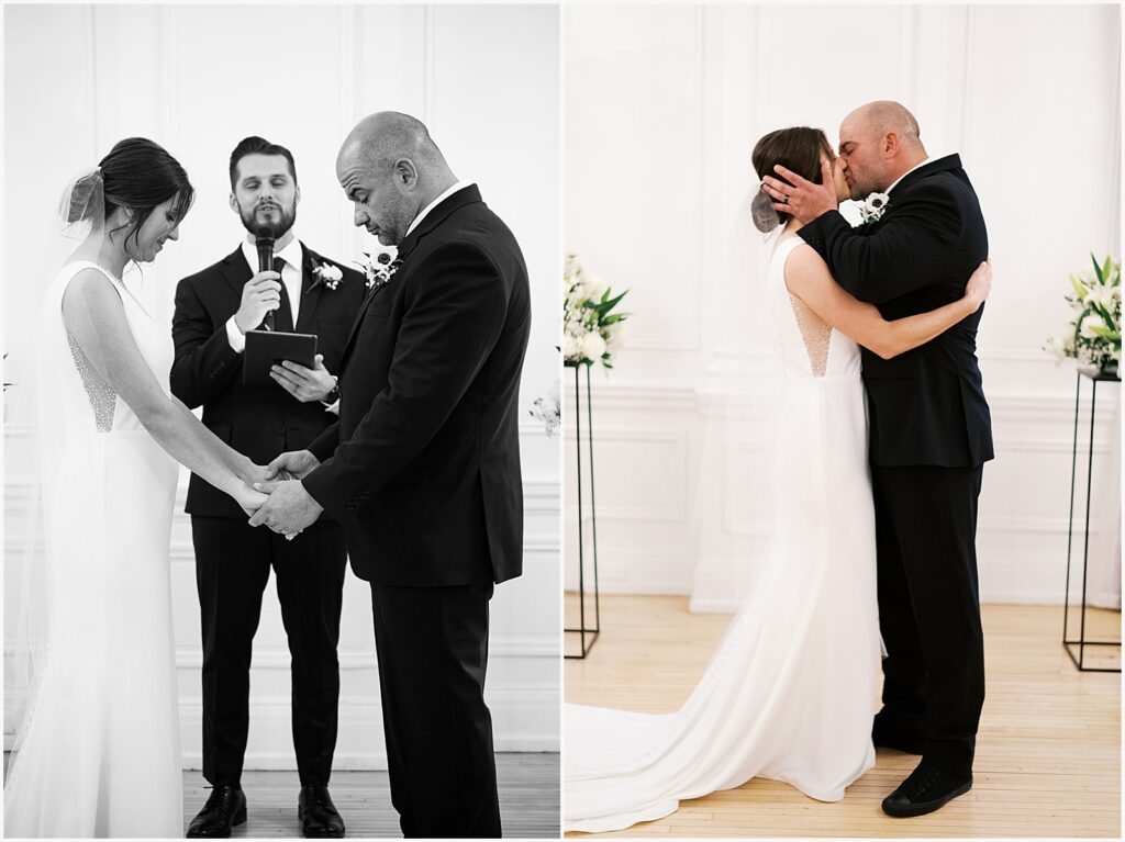 A bride and groom bow their heads while an officiant reads a prayer during a Des Moines wedding ceremony.