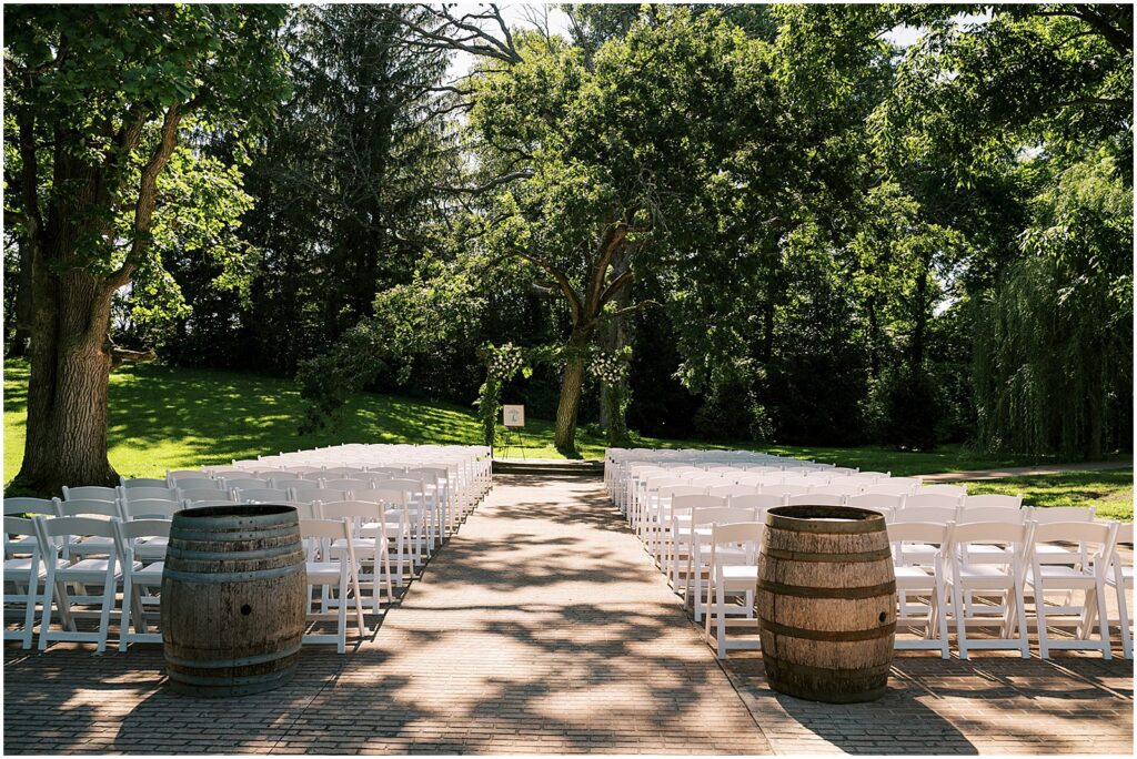Chairs are set up for an outdoor wedding ceremony at Wilson's Ciderhouse.