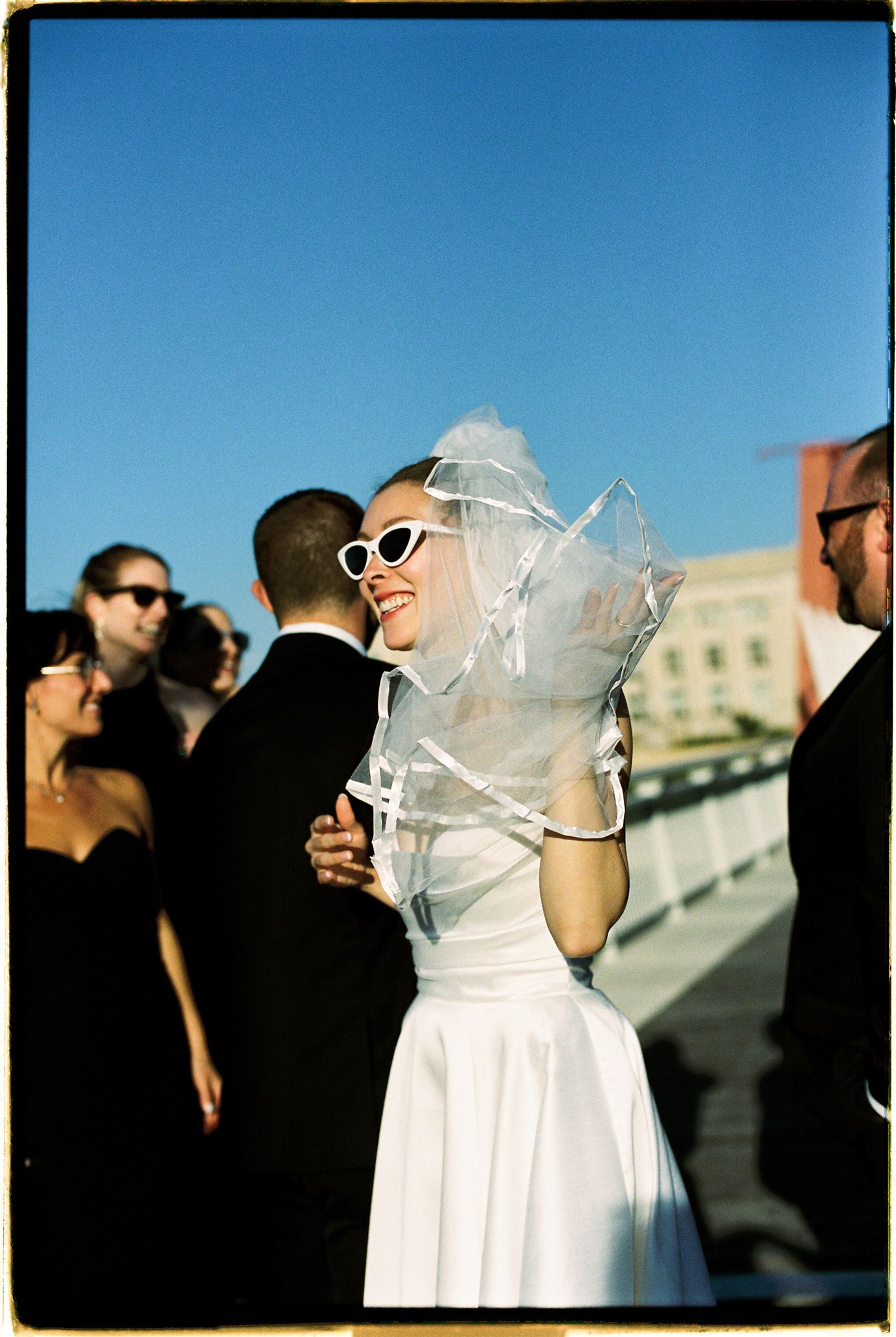 Bride and groom smiling post ceremony in meaningful moment in documentary-style wedding photography