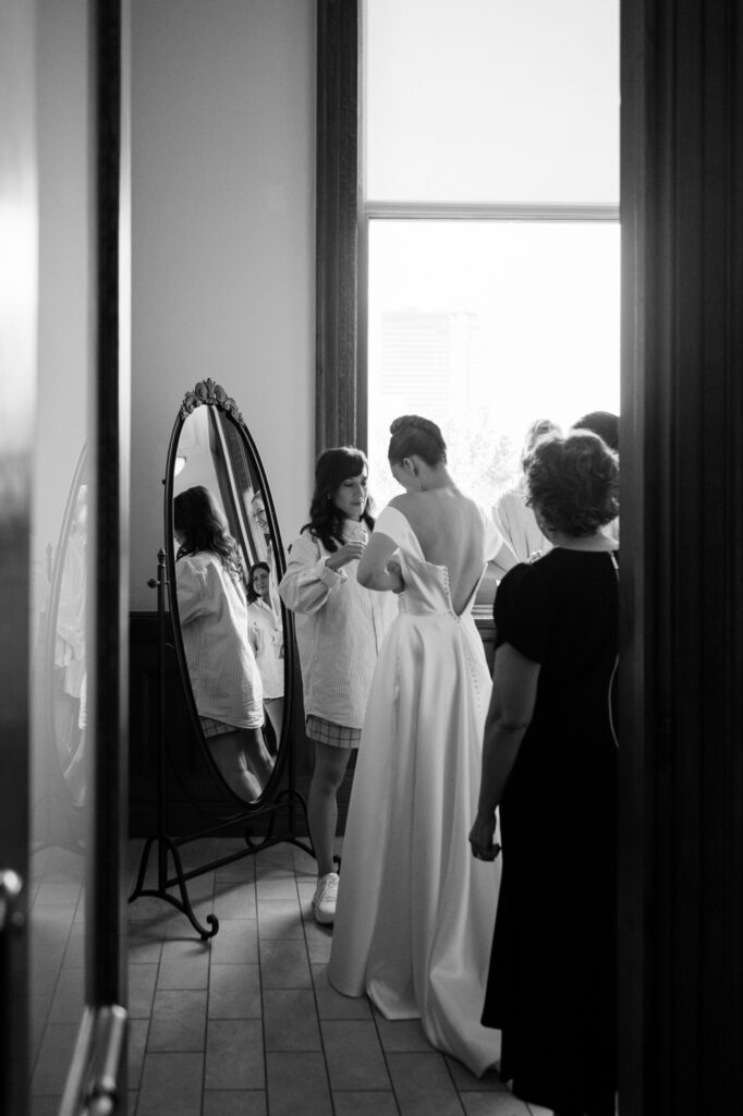 Bride gets ready with friends